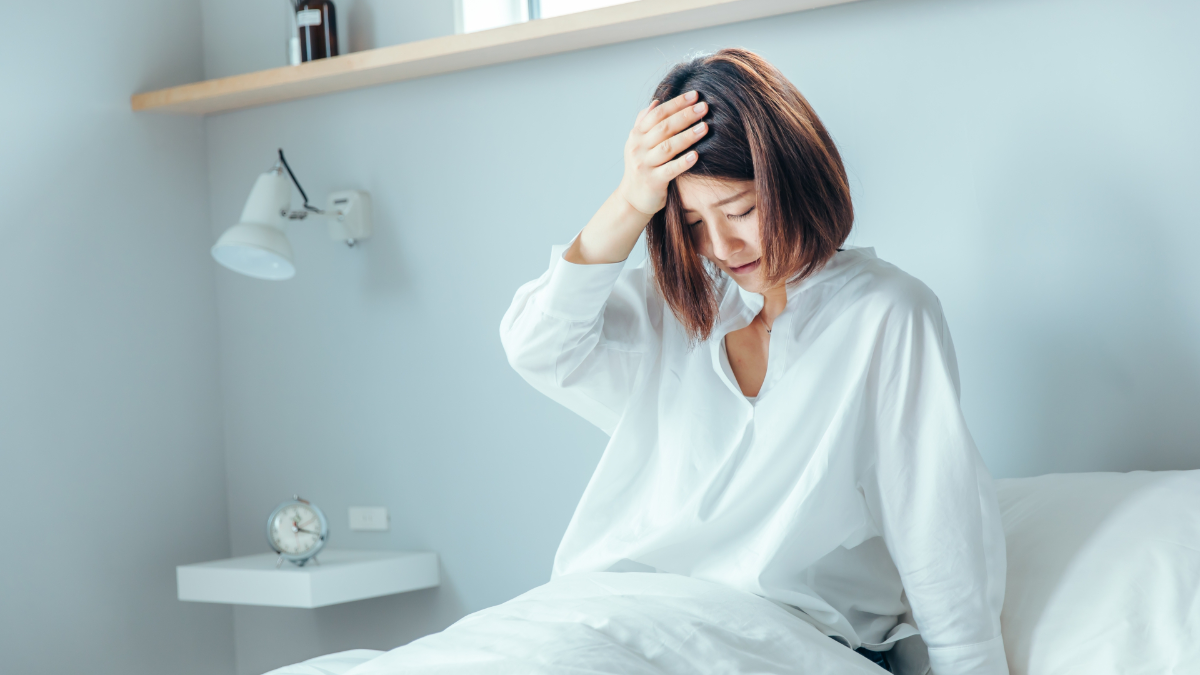体調が優れない女性